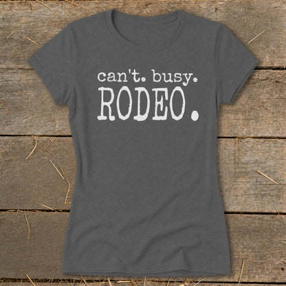 Grey t-shirt with white text reading "can't. busy. RODEO."