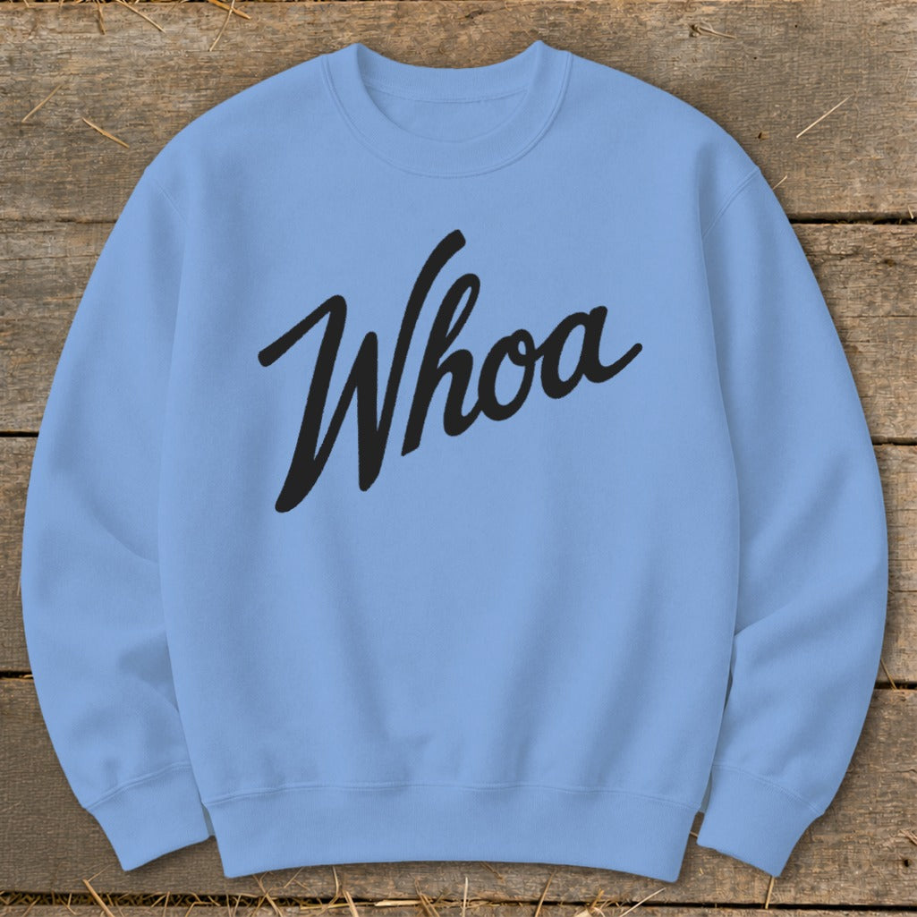Light blue crewneck sweatshirt with "Whoa" in black cursive text.