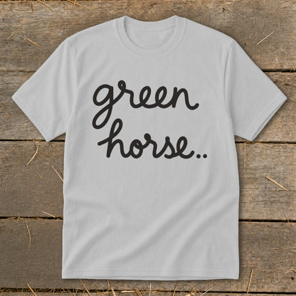 Light gray t-shirt with black cursive text "green horse..".