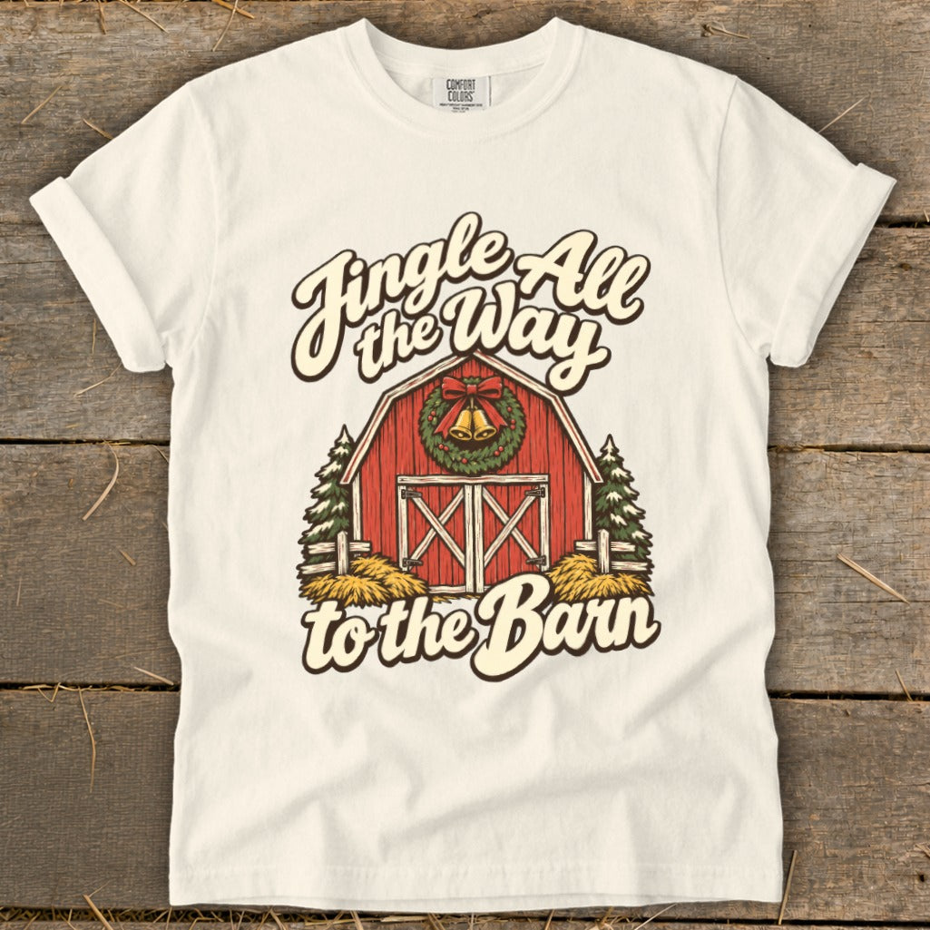 White t-shirt with red barn graphic and "Jingle All the Way to the Barn" text.