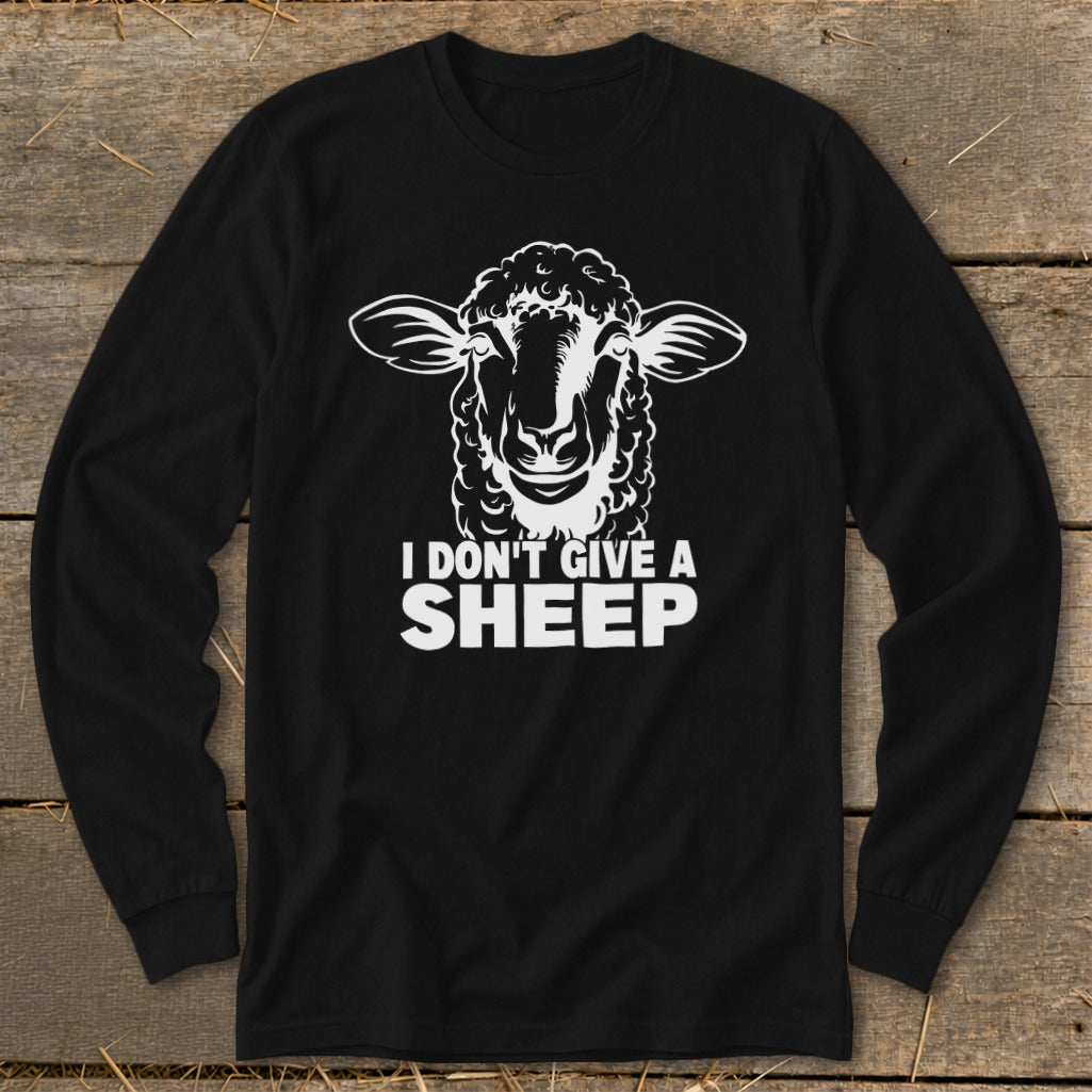 Black long-sleeve shirt with white sheep graphic and text "I DON'T GIVE A SHEEP".