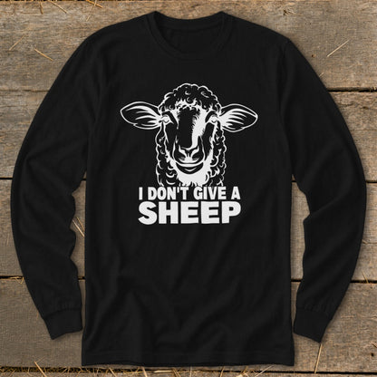 Black long-sleeve shirt with white sheep graphic and text "I DON'T GIVE A SHEEP".