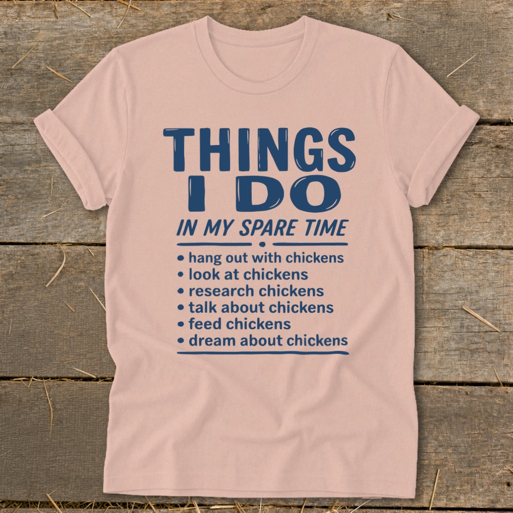 Pink t-shirt with "Things I Do In My Spare Time" and chicken-related activities listed.