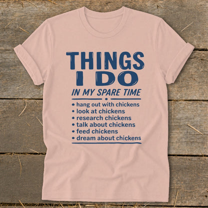 Pink t-shirt with "Things I Do In My Spare Time" and chicken-related activities listed.