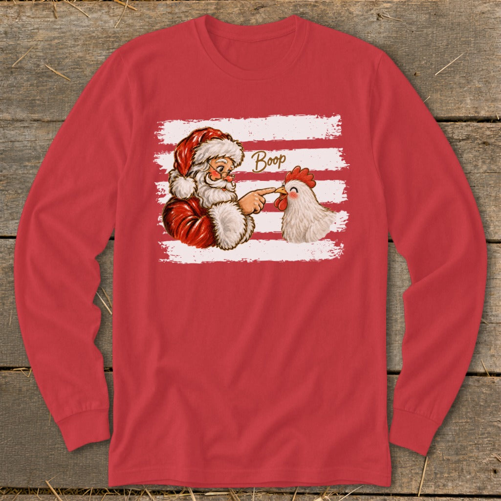 Santa booping a chicken with the word "Boop" above.