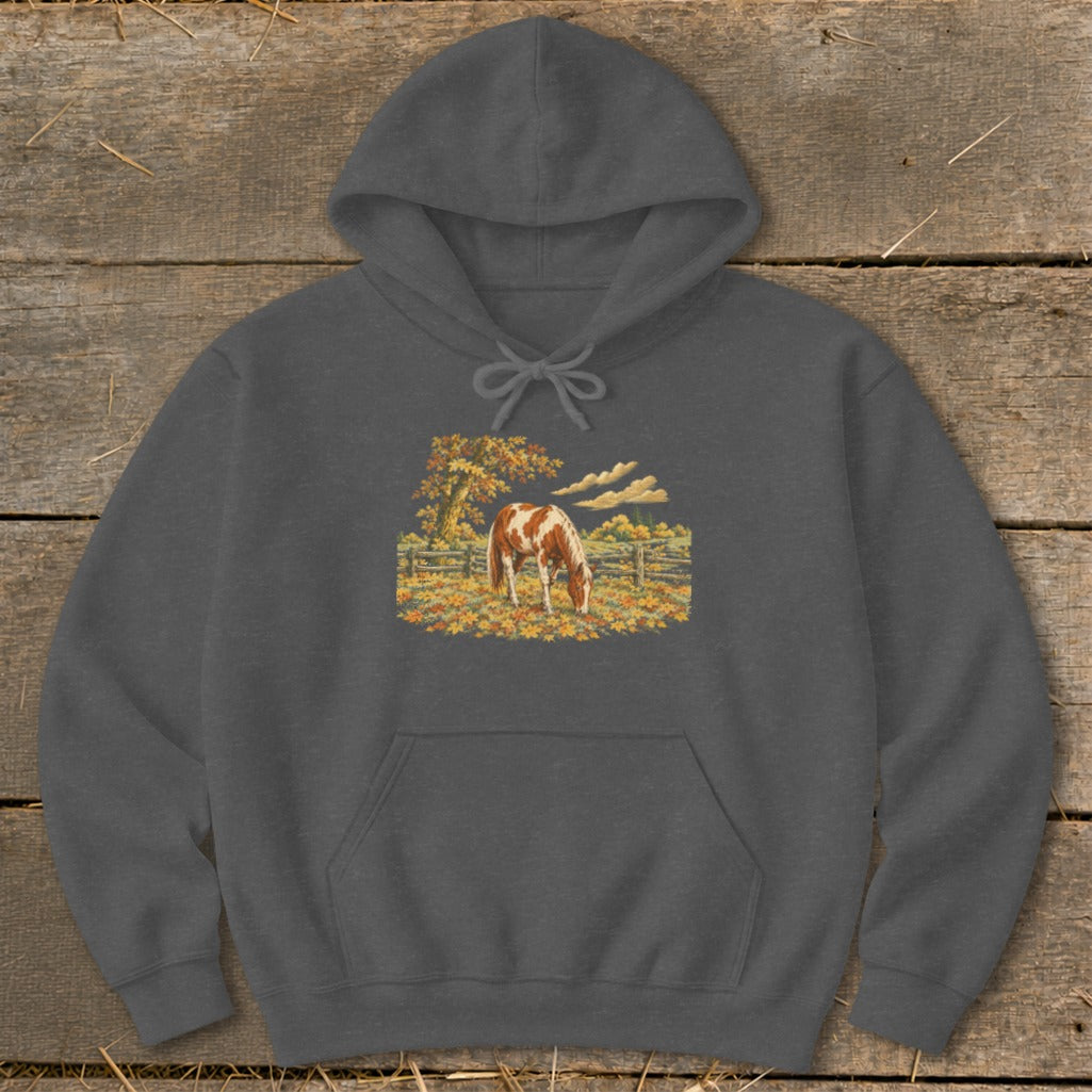 Dark gray hoodie with a graphic of a brown and white horse grazing in an autumn field.