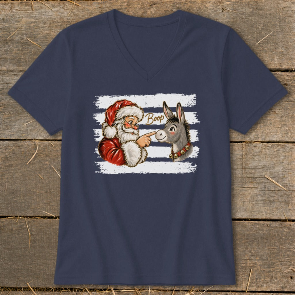 Santa Claus boops a donkey with the word "Boop" above it.