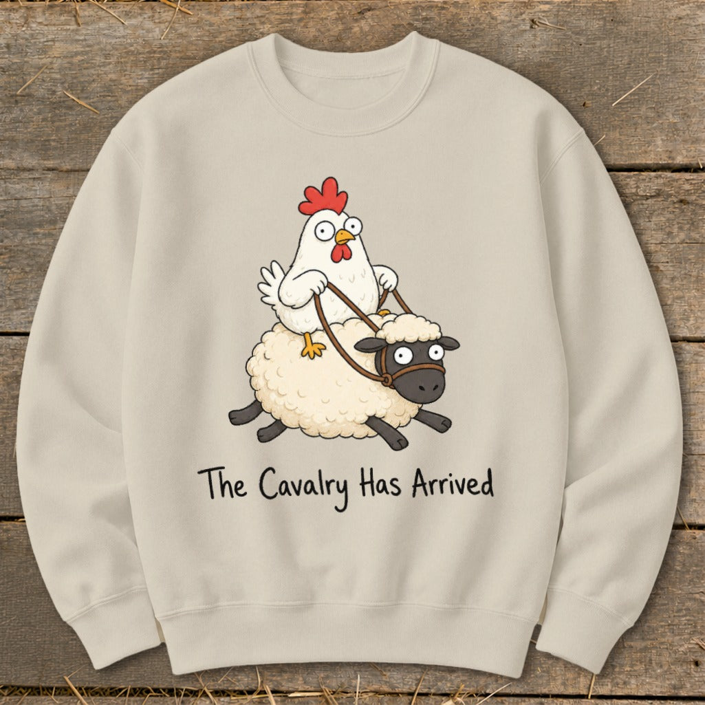 Light beige sweatshirt with cartoon chicken riding a sheep, text reads "The Cavalry Has Arrived".