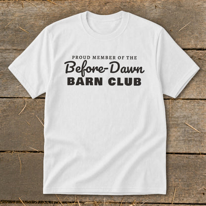 White t-shirt with black text reading "Proud Member of the Before-Dawn Barn Club."