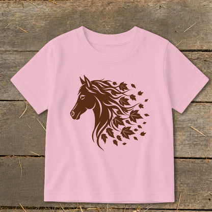 Pink t-shirt with brown horse head graphic and falling leaves design.