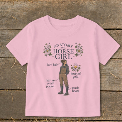 Pink t-shirt with "Anatomy of a Horse Girl" text and illustration.