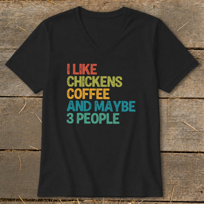 Black v-neck t-shirt with colorful text: I LIKE CHICKENS COFFEE AND MAYBE 3 PEOPLE.