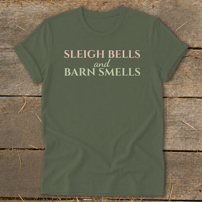 Olive green t-shirt with "Sleigh Bells and Barn Smells" text.