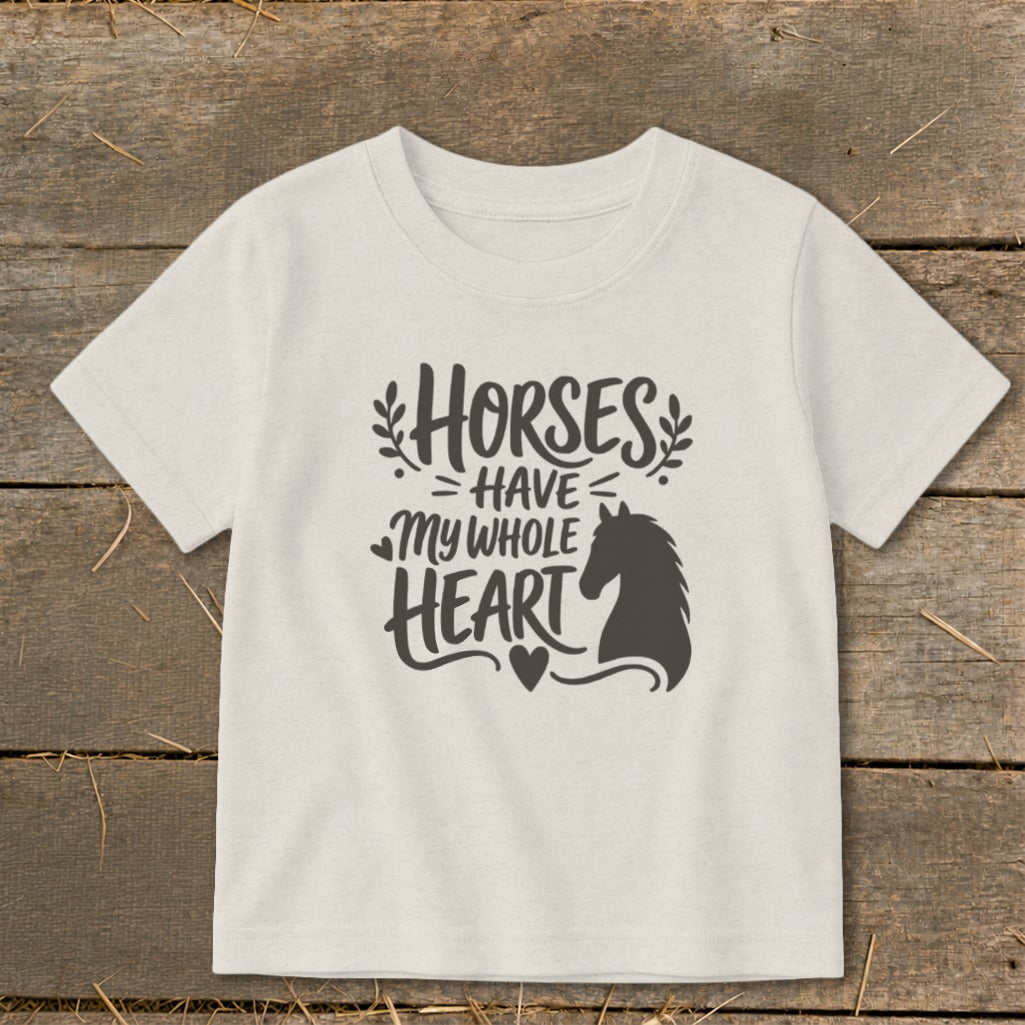 Light beige t-shirt with "Horses Have My Whole Heart" and horse silhouette design.