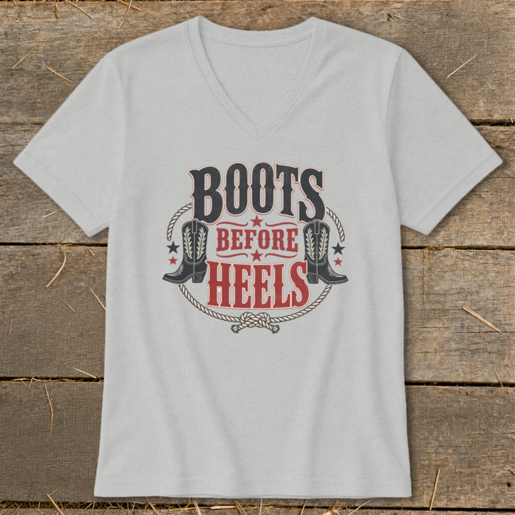 Light gray v-neck t-shirt with "BOOTS BEFORE HEELS" text and cowboy boots graphic.