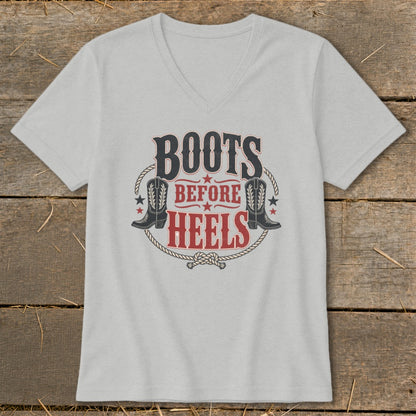 Light gray v-neck t-shirt with "BOOTS BEFORE HEELS" text and cowboy boots graphic.