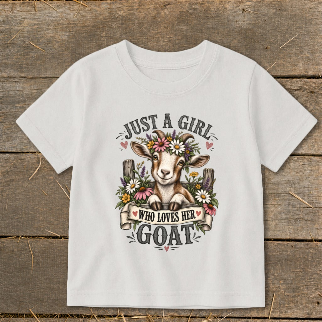 White t-shirt graphic with a goat wearing a flower crown and the text "Just a girl who loves her goat".
