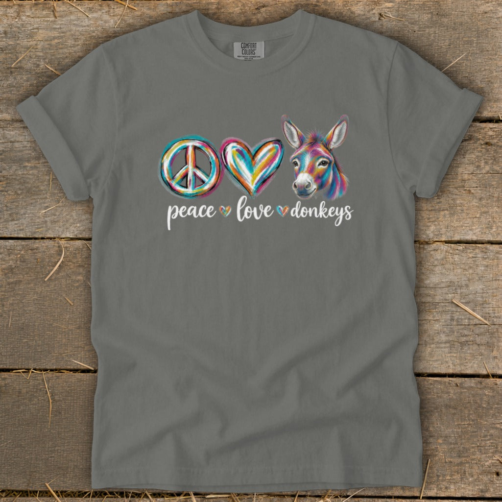 Grey t-shirt with peace sign, heart, and colorful donkey graphic.