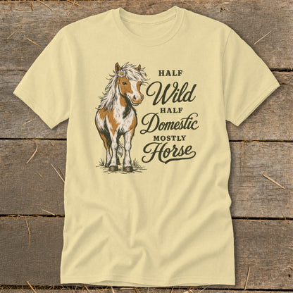 Light yellow t-shirt with horse graphic and text "Half Wild Half Domestic Mostly Horse."
