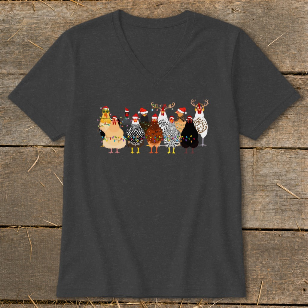 Several chickens wearing Santa hats and Christmas lights on a dark grey v-neck shirt.