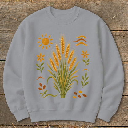 Gray sweatshirt with a central illustration of wheat stalks and surrounding floral and sun elements.