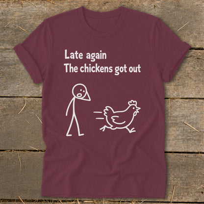 Maroon t-shirt with white text and illustration of a stick figure and chicken.