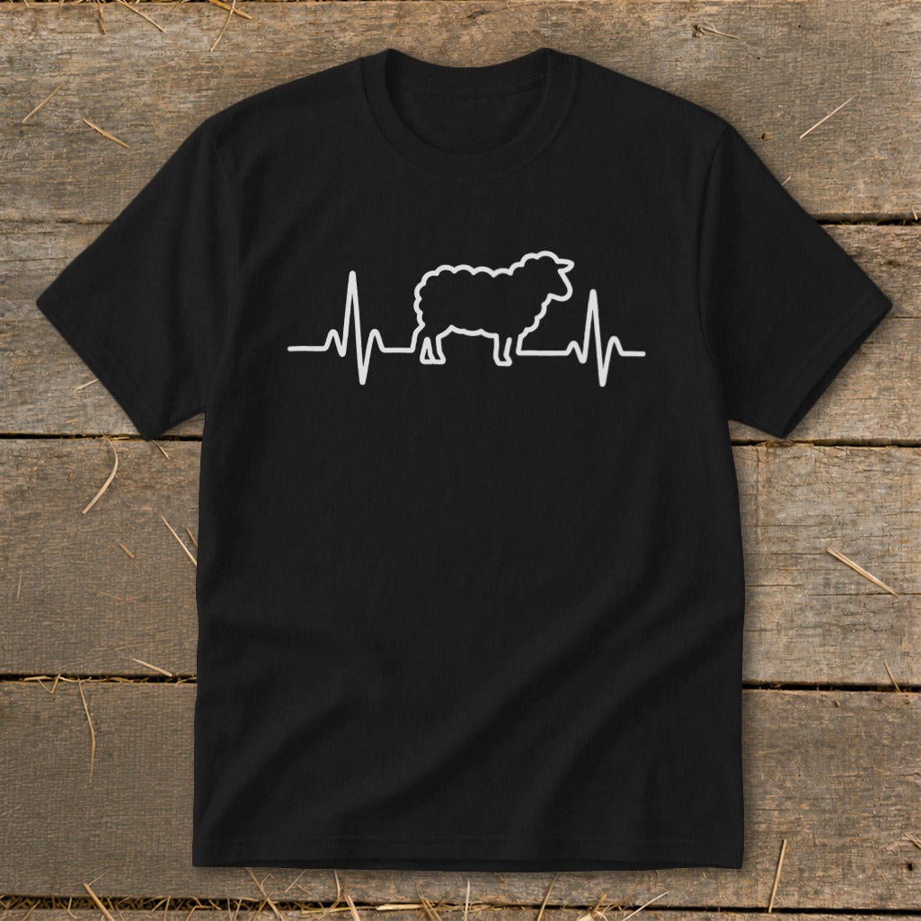 A black t-shirt printed with a white sheep silhouette integrated into a heartbeat line.
