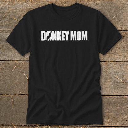 Black t-shirt featuring the white text Donkey Mom with a small donkey silhouette inside the letter O.