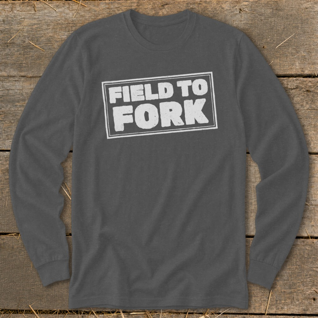 Dark gray long-sleeved t-shirt featuring a white distressed graphic with the text FIELD TO FORK.