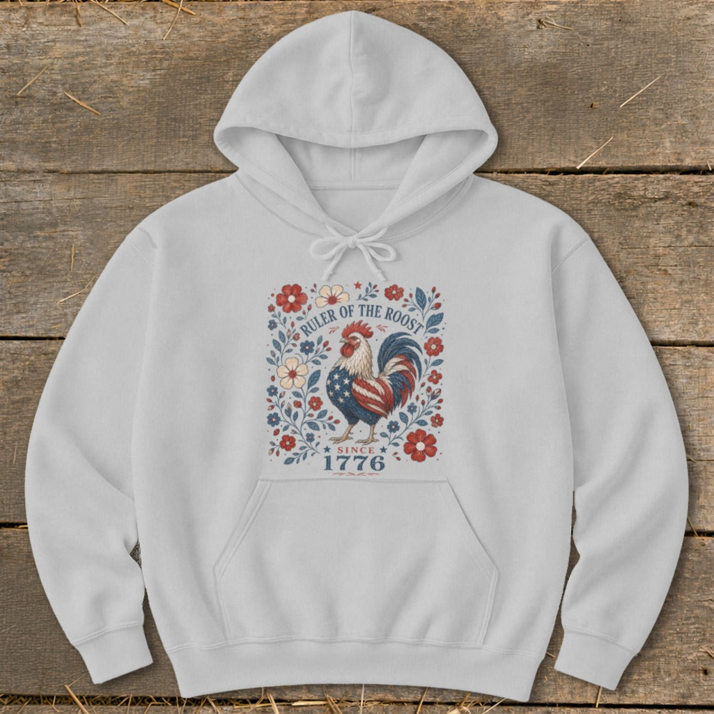 White hoodie with a patriotic rooster design and text "Ruler of the Roost Since 1776".