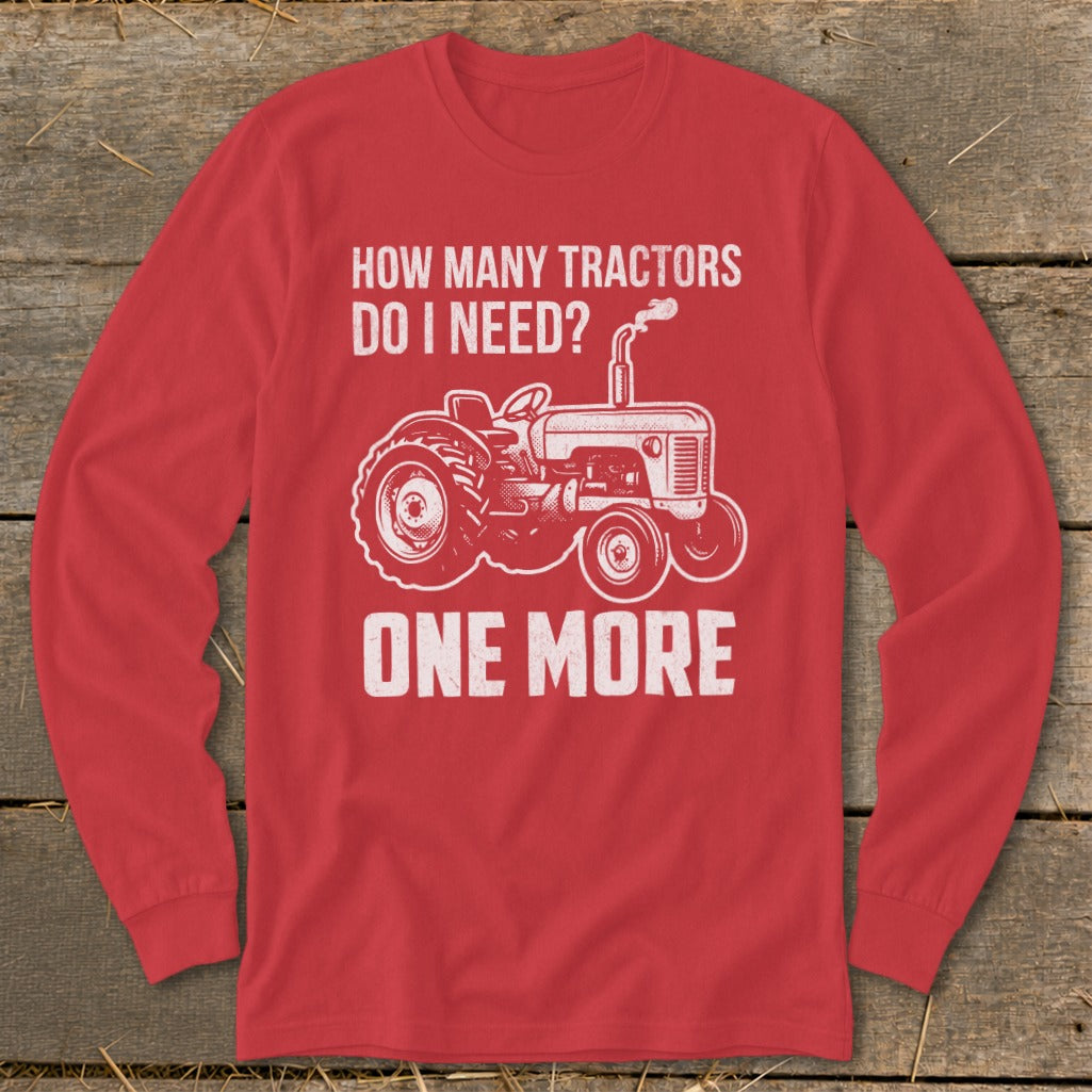 Red long-sleeve shirt with "How Many Tractors Do I Need? One More" and tractor graphic.