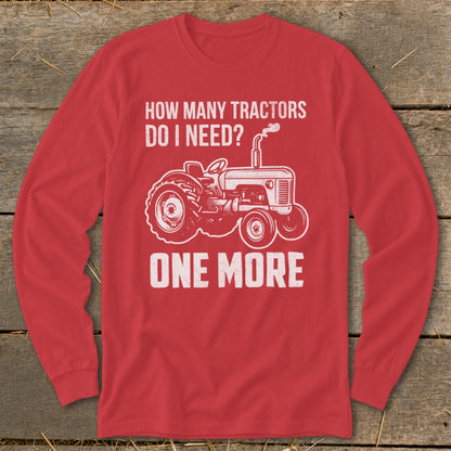 Red long-sleeve shirt with "How Many Tractors Do I Need? One More" and tractor graphic.