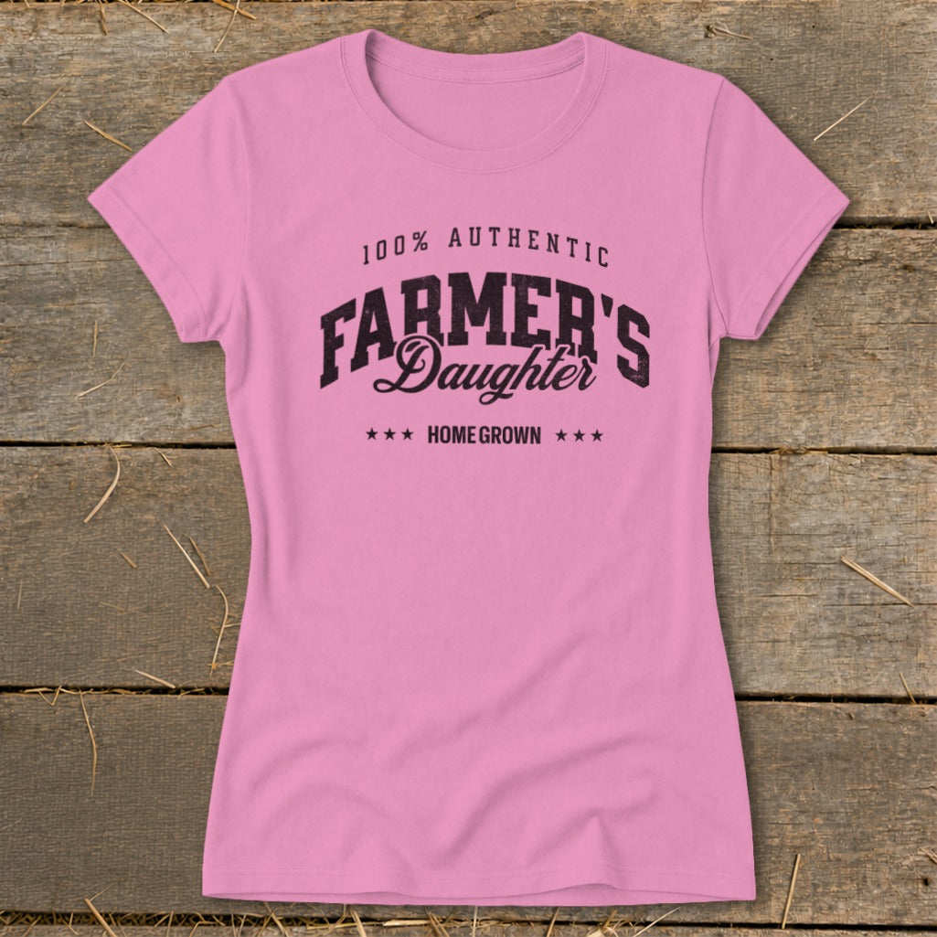 Pink t-shirt with "100% Authentic Farmer's Daughter Homegrown" graphic text.
