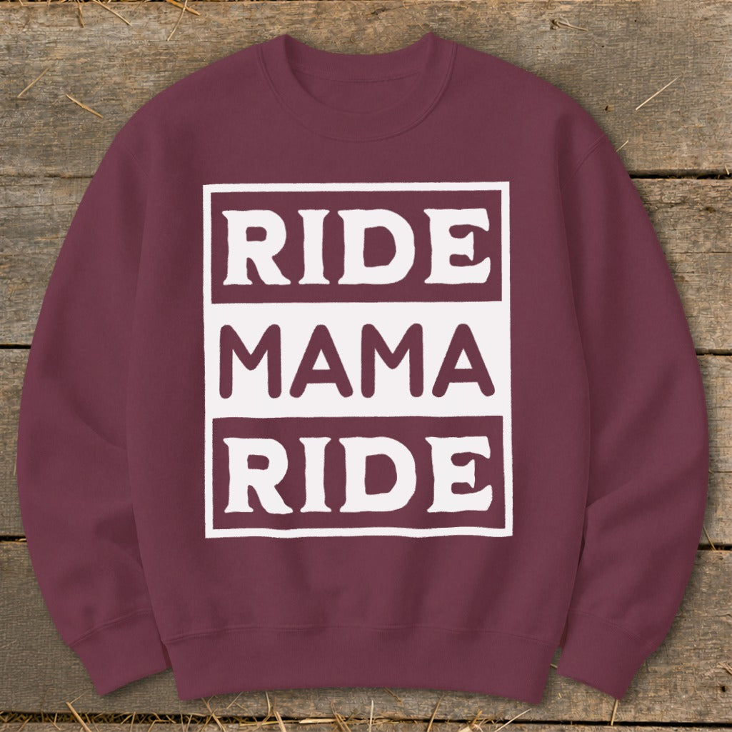 Maroon sweatshirt with white text: "RIDE MAMA RIDE" in stacked boxes.