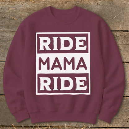 Maroon sweatshirt with white text: "RIDE MAMA RIDE" in stacked boxes.
