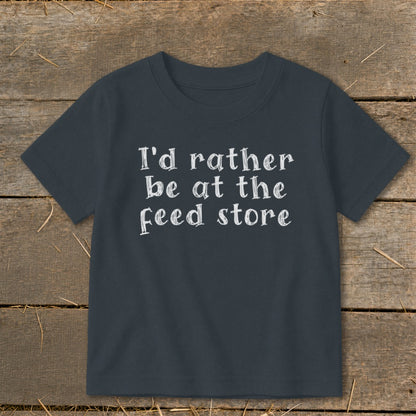 Dark grey t-shirt with white text that reads "I'd rather be at the feed store".