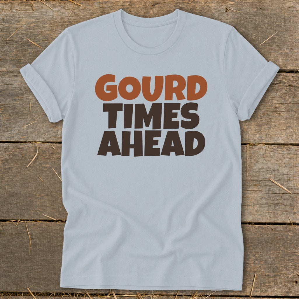 Light blue t-shirt with "Gourd Times Ahead" text in brown and orange.