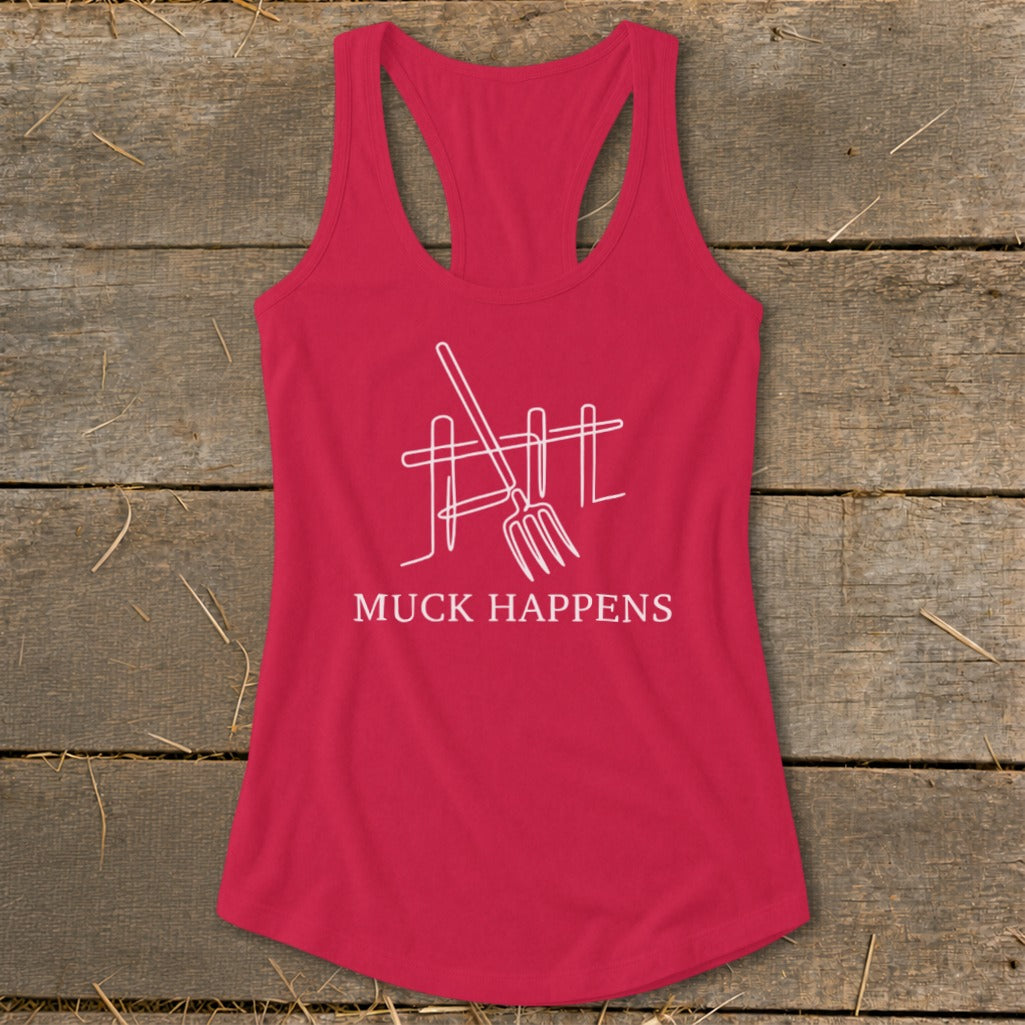 Red racerback tank top with white line art of a pitchfork and fence, reading "MUCK HAPPENS".