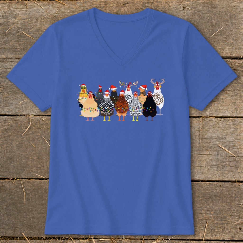 Group of chickens wearing Santa hats and Christmas lights on a blue v-neck shirt.