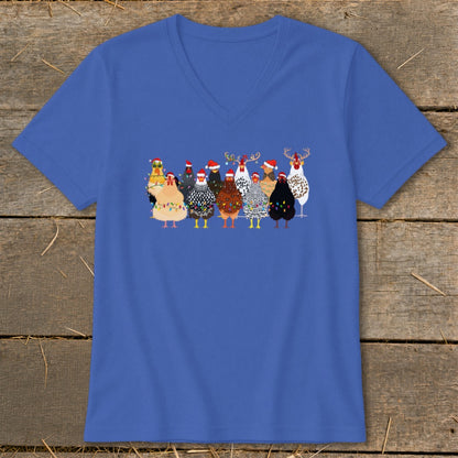 Group of chickens wearing Santa hats and Christmas lights on a blue v-neck shirt.