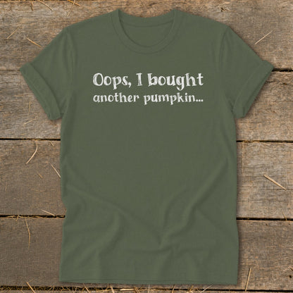 Olive green t-shirt with white text: Oops, I bought another pumpkin...