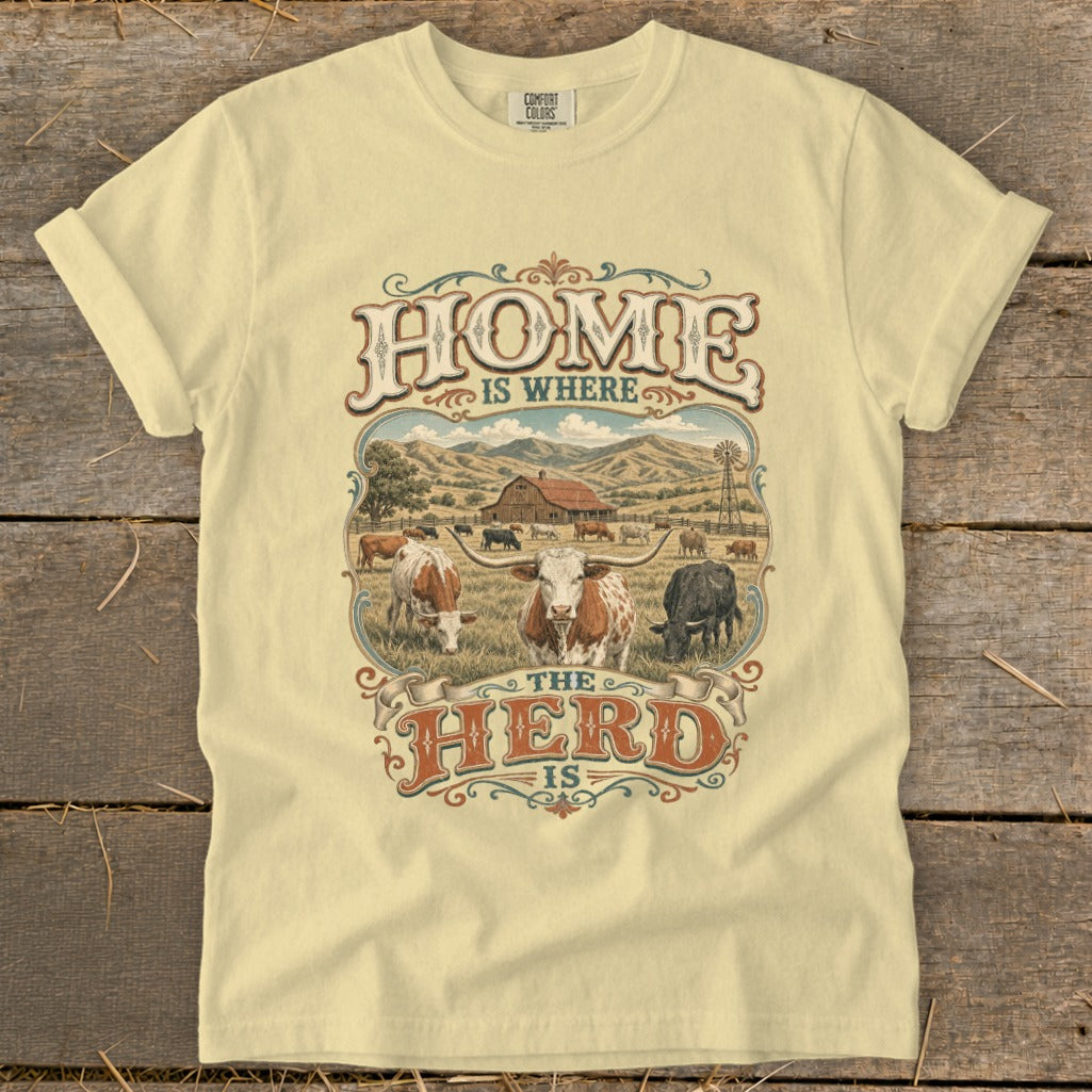 T-shirt graphic with text "HOME IS WHERE THE HERD IS" and farm scene.