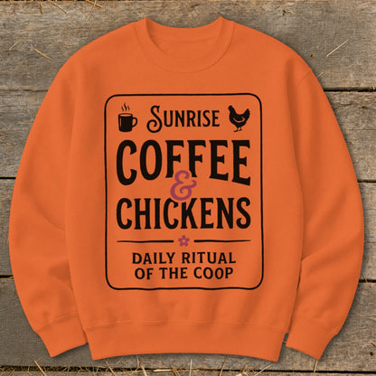 Orange sweatshirt with "Sunrise Coffee & Chickens Daily Ritual of the Coop" graphic.