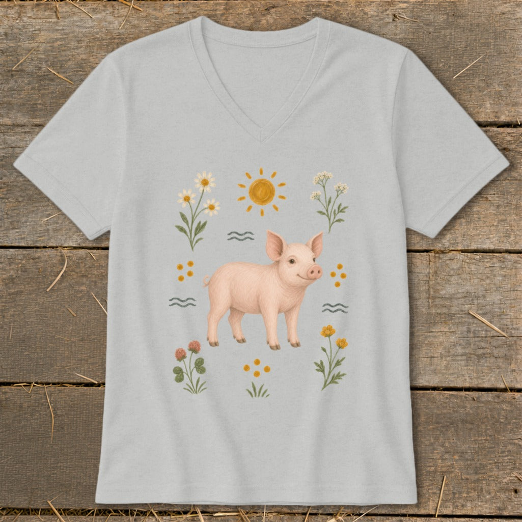 Light gray v-neck t-shirt with a happy pink piglet surrounded by flowers, sun, and waves.