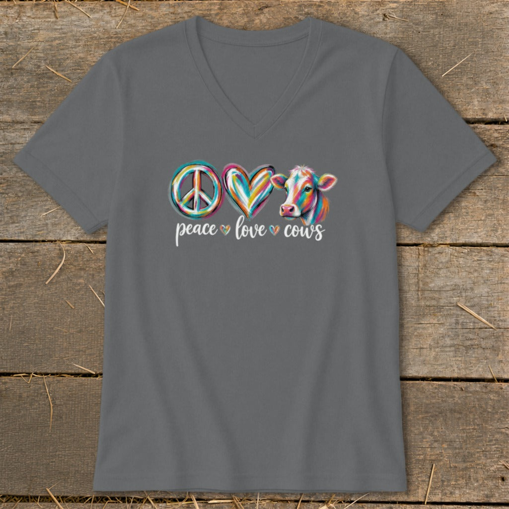 T-shirt with peace, heart, and cow graphics and text "peace love cows".