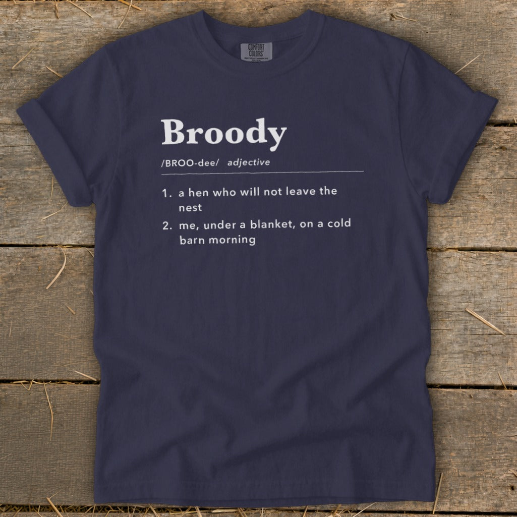 Navy t-shirt with "Broody" definition: hen not leaving nest, or under a blanket.