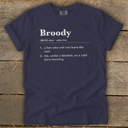 Navy t-shirt with "Broody" definition: hen not leaving nest, or under a blanket.
