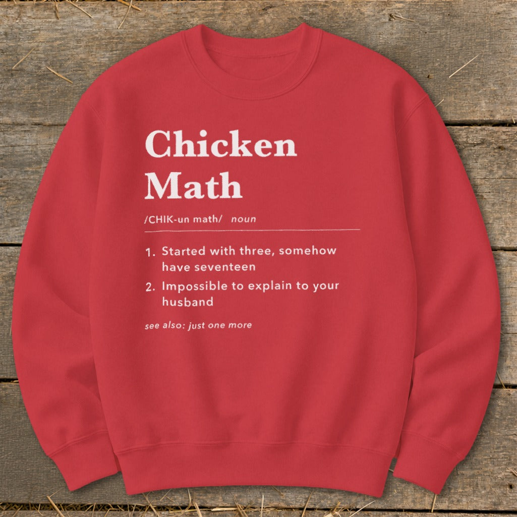 Red sweatshirt with "Chicken Math" definition: "Started with three, somehow have seventeen. Impossible to explain to your husband."