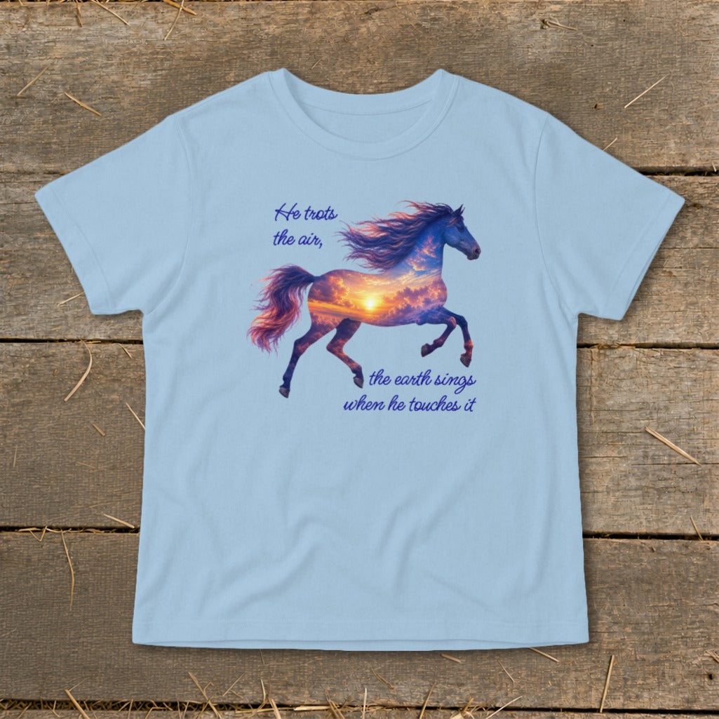 Light blue t-shirt featuring a running horse graphic filled with a sunset sky and text.