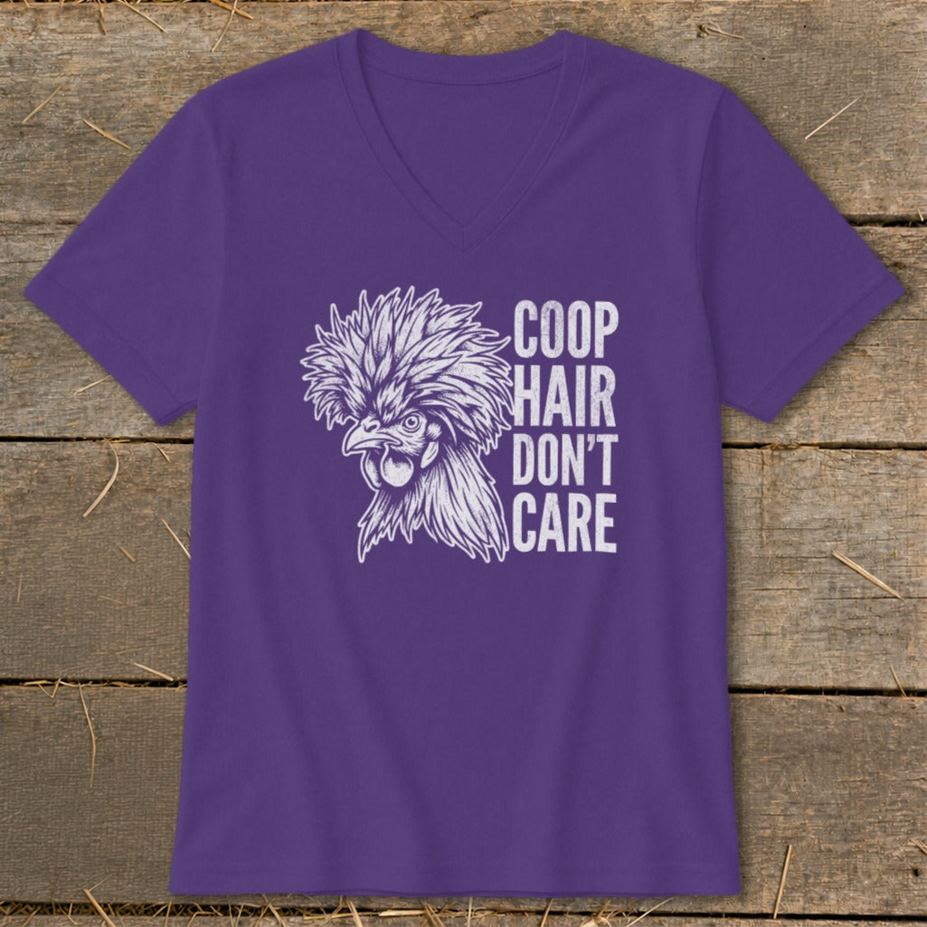 Purple t-shirt with a white drawing of a fluffy chicken and text "Coop Hair Don't Care".
